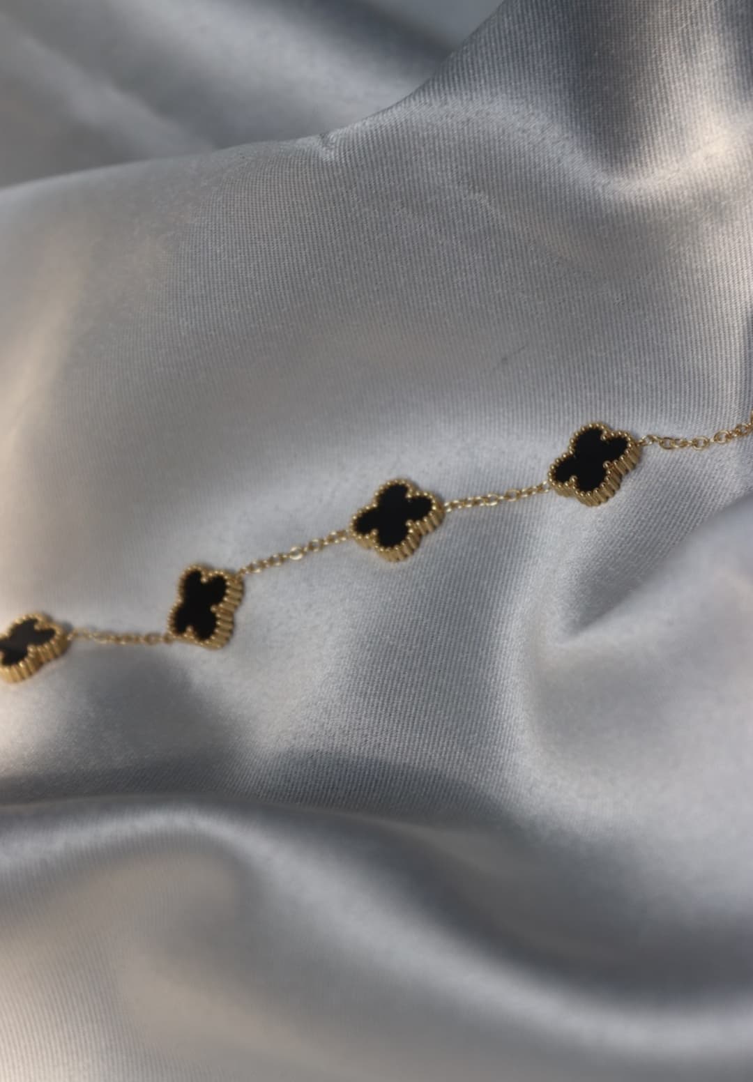Noir Clover Motif Station Bracelet